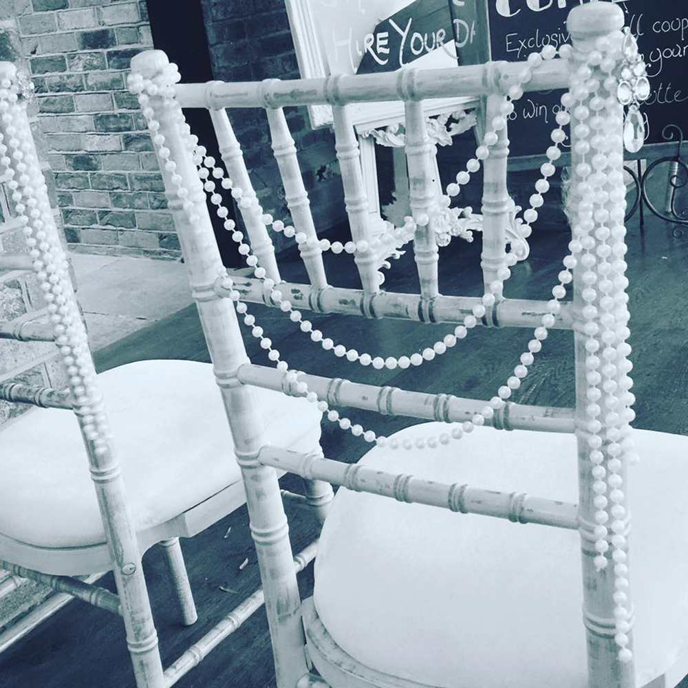 pearl garlands and brooch