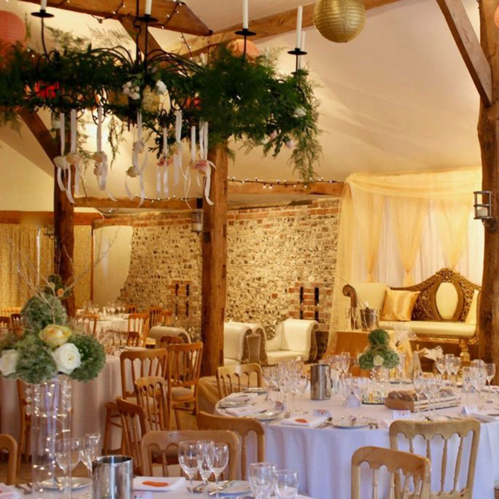 upwaltham-barns-chichester-stage-hire-backdrop-with-gold-swags