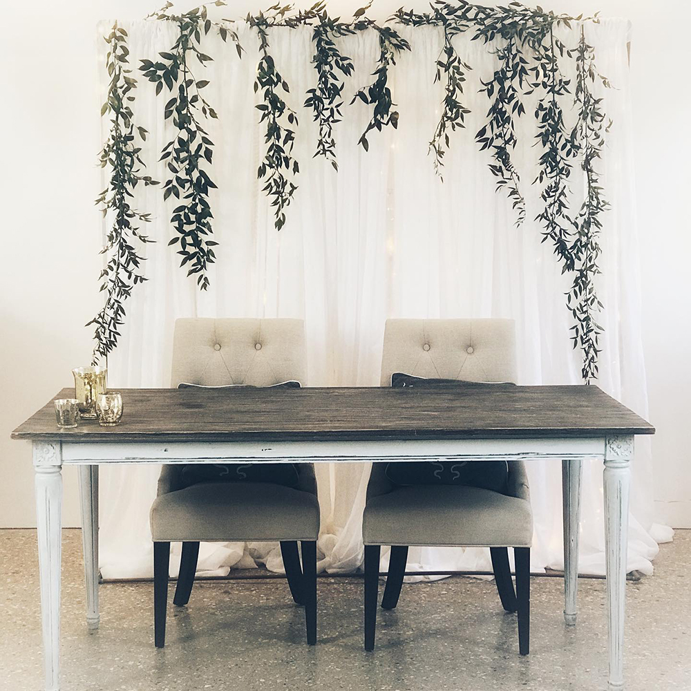 voile backdrop and ruscus